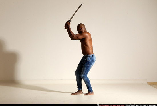 Man Adult Athletic Black Fighting with sword Moving poses Pants