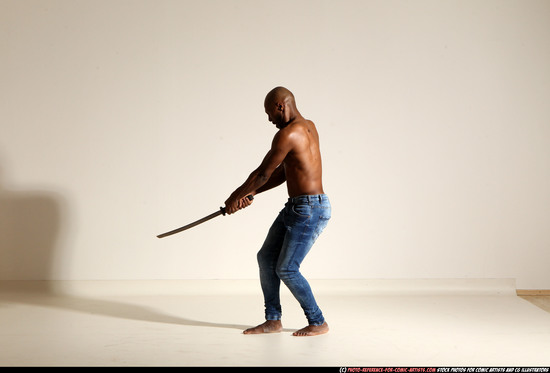 Man Adult Athletic Black Fighting with sword Moving poses Pants