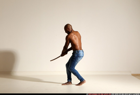 Man Adult Athletic Black Fighting with sword Moving poses Pants