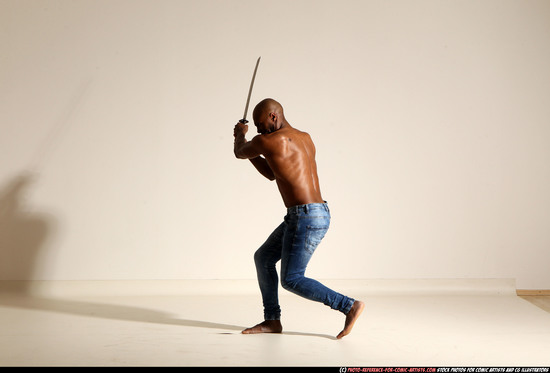 Man Adult Athletic Black Fighting with sword Moving poses Pants