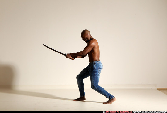 Man Adult Athletic Black Fighting with sword Moving poses Pants