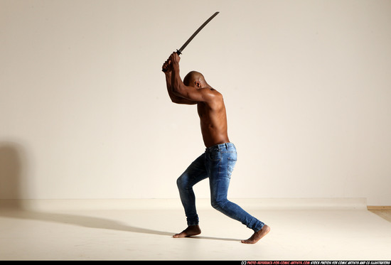 Man Adult Athletic Black Fighting with sword Moving poses Pants