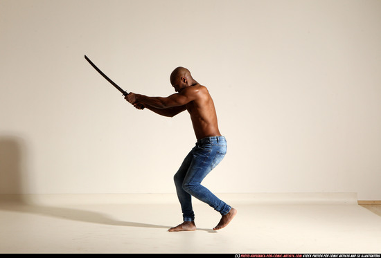 Man Adult Athletic Black Fighting with sword Moving poses Pants