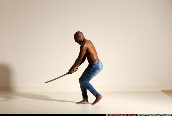 Man Adult Athletic Black Fighting with sword Moving poses Pants