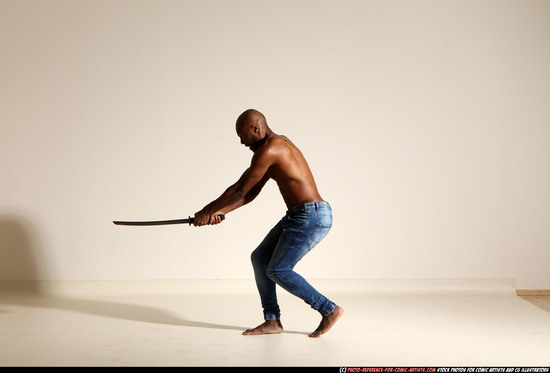 Man Adult Athletic Black Fighting with sword Moving poses Pants