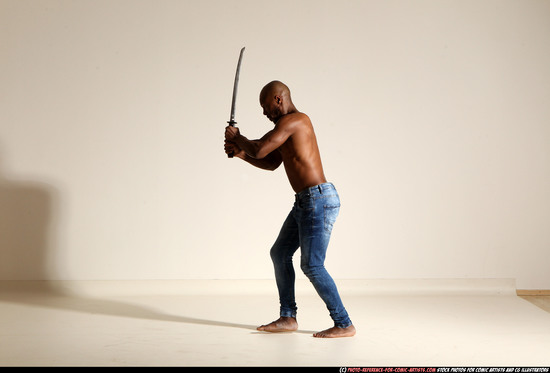 Man Adult Athletic Black Fighting with sword Moving poses Pants