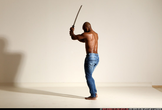 Man Adult Athletic Black Fighting with sword Moving poses Pants