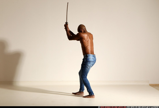 Man Adult Athletic Black Fighting with sword Moving poses Pants