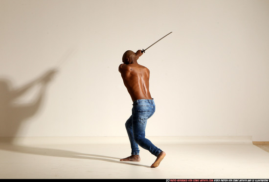 Man Adult Athletic Black Fighting with sword Moving poses Pants