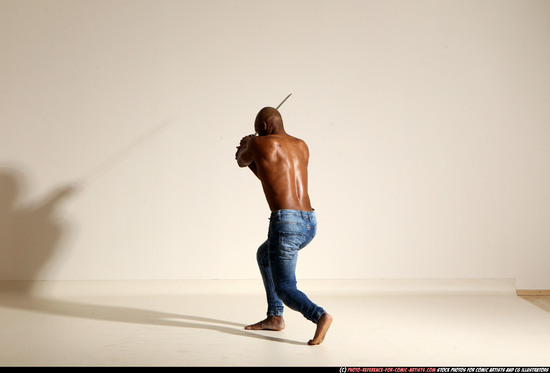 Man Adult Athletic Black Fighting with sword Moving poses Pants