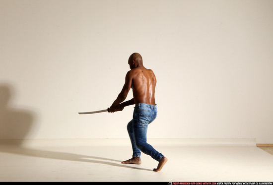 Man Adult Athletic Black Fighting with sword Moving poses Pants