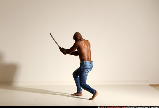 Man Adult Athletic Black Fighting with sword Moving poses Pants