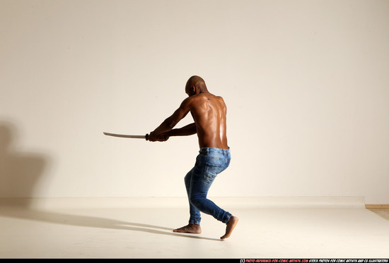 Man Adult Athletic Black Fighting with sword Moving poses Pants