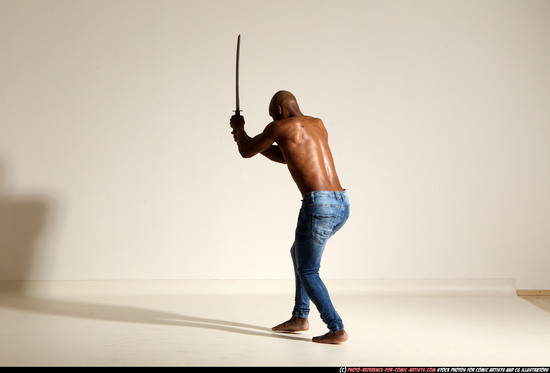 Man Adult Athletic Black Fighting with sword Moving poses Pants