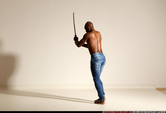 Man Adult Athletic Black Fighting with sword Moving poses Pants