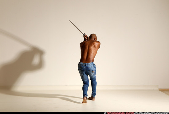 Man Adult Athletic Black Fighting with sword Moving poses Pants