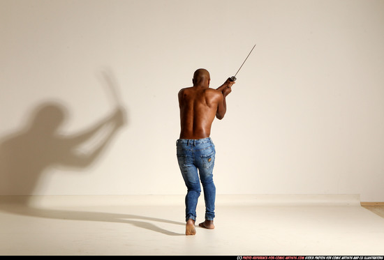 Man Adult Athletic Black Fighting with sword Moving poses Pants