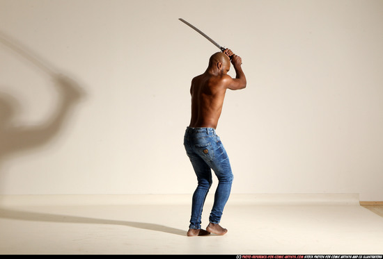 Man Adult Athletic Black Fighting with sword Moving poses Pants