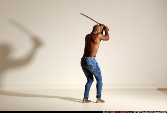 Man Adult Athletic Black Fighting with sword Moving poses Pants