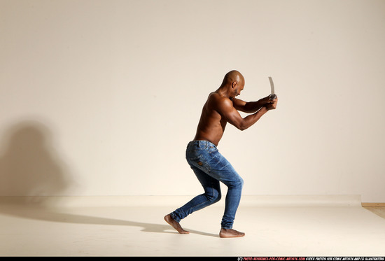 Man Adult Athletic Black Fighting with sword Moving poses Pants