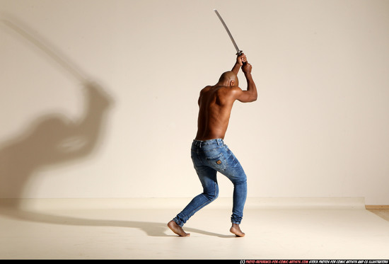 Man Adult Athletic Black Fighting with sword Moving poses Pants