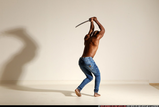 Man Adult Athletic Black Fighting with sword Moving poses Pants