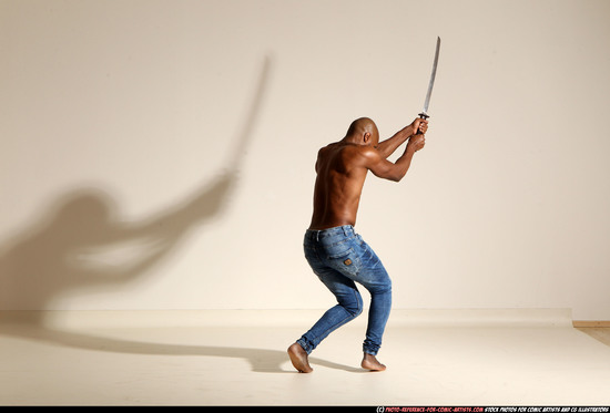 Man Adult Athletic Black Fighting with sword Moving poses Pants