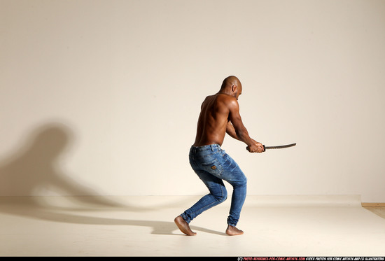 Man Adult Athletic Black Fighting with sword Moving poses Pants