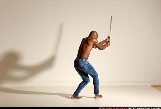 Man Adult Athletic Black Fighting with sword Moving poses Pants