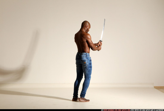 Man Adult Athletic Black Fighting with sword Moving poses Pants