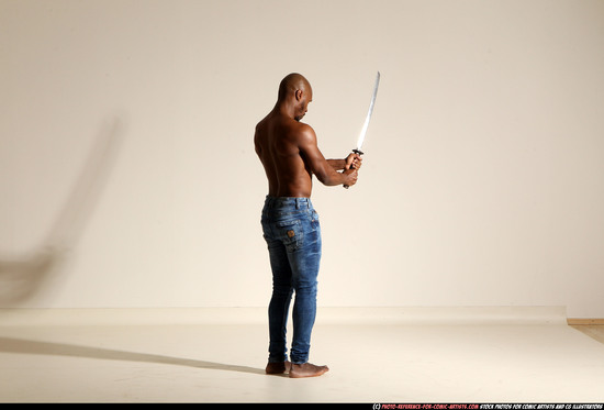 Man Adult Athletic Black Fighting with sword Moving poses Pants