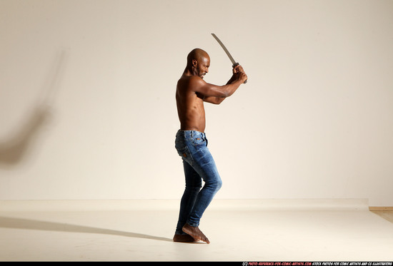 Man Adult Athletic Black Fighting with sword Moving poses Pants