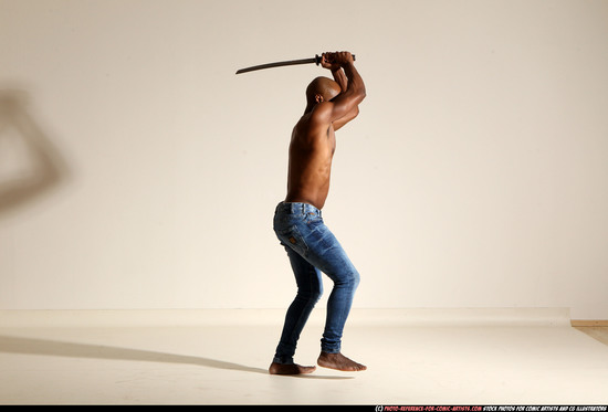 Man Adult Athletic Black Fighting with sword Moving poses Pants