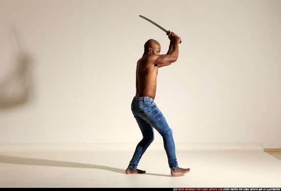 Man Adult Athletic Black Fighting with sword Moving poses Pants