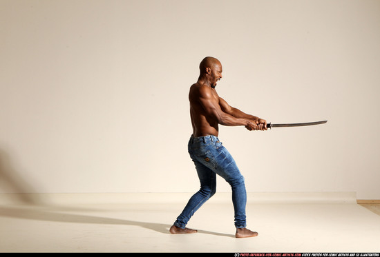 Man Adult Athletic Black Fighting with sword Moving poses Pants