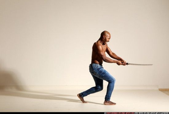 Man Adult Athletic Black Fighting with sword Moving poses Pants