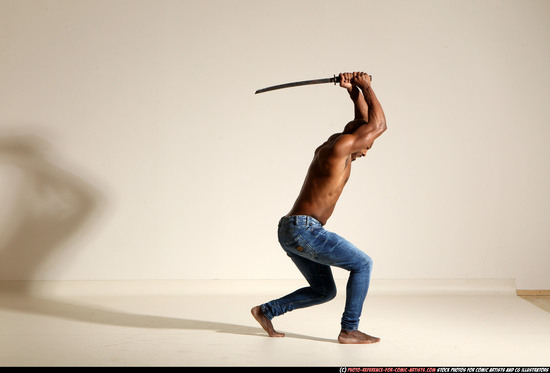 Man Adult Athletic Black Fighting with sword Moving poses Pants