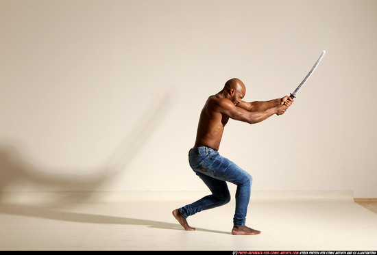 Man Adult Athletic Black Fighting with sword Moving poses Pants