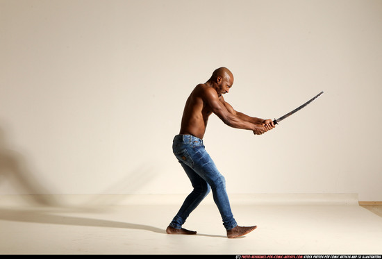 Man Adult Athletic Black Fighting with sword Moving poses Pants