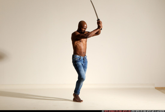 Man Adult Athletic Black Fighting with sword Moving poses Pants