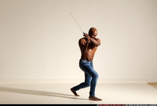 Man Adult Athletic Black Fighting with sword Moving poses Pants