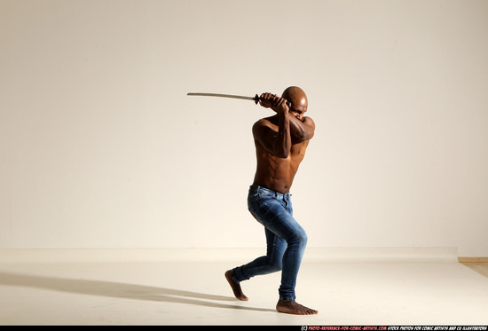 Man Adult Athletic Black Fighting with sword Moving poses Pants