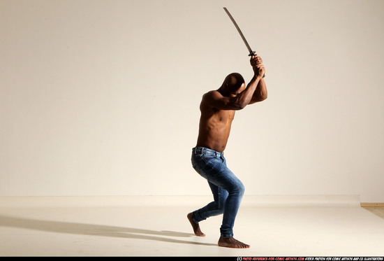 Man Adult Athletic Black Fighting with sword Moving poses Pants