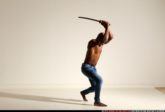 Man Adult Athletic Black Fighting with sword Moving poses Pants