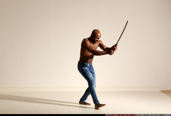 Man Adult Athletic Black Fighting with sword Moving poses Pants