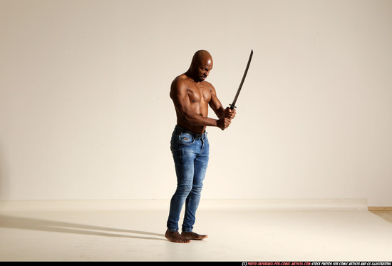 Man Adult Athletic Black Fighting with sword Moving poses Pants