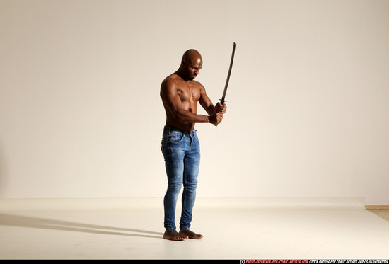 Man Adult Athletic Black Fighting with sword Moving poses Pants