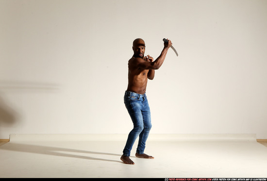 Man Adult Athletic Black Fighting with sword Moving poses Pants