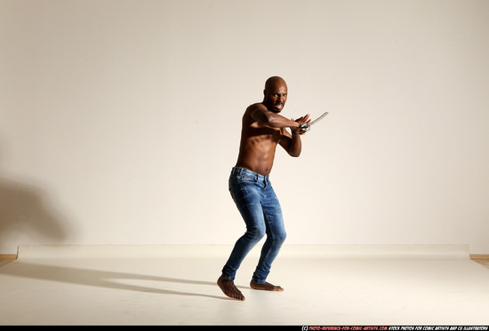 Man Adult Athletic Black Fighting with sword Moving poses Pants