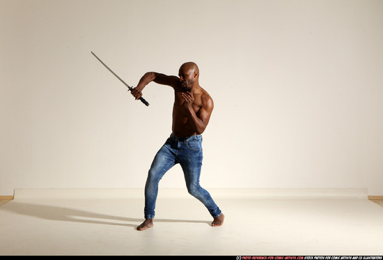 Man Adult Athletic Black Fighting with sword Moving poses Pants